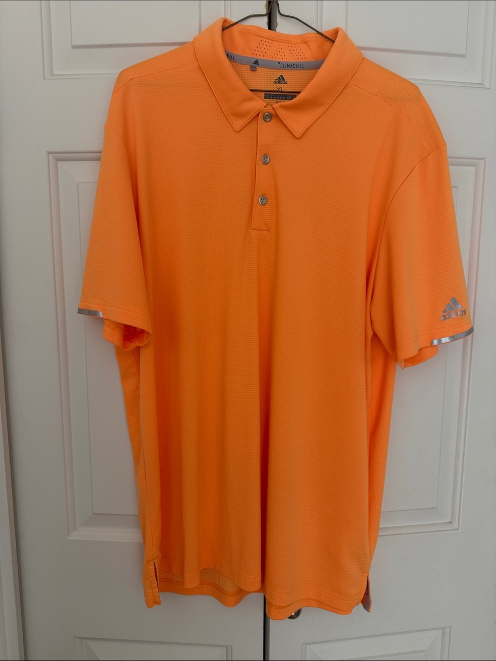 Orange Adidas Climachill golf shirt